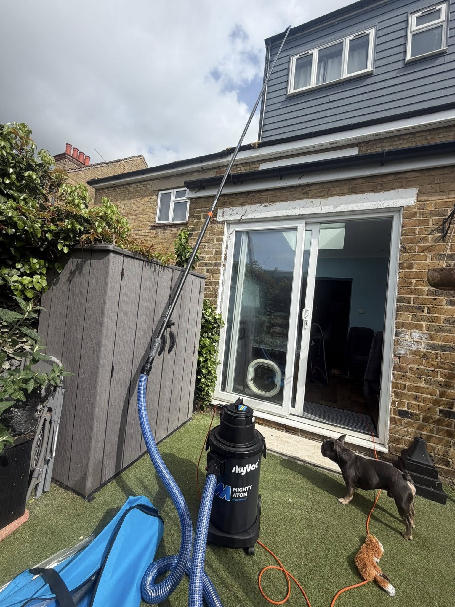 Garden patio with pressure washing equipment